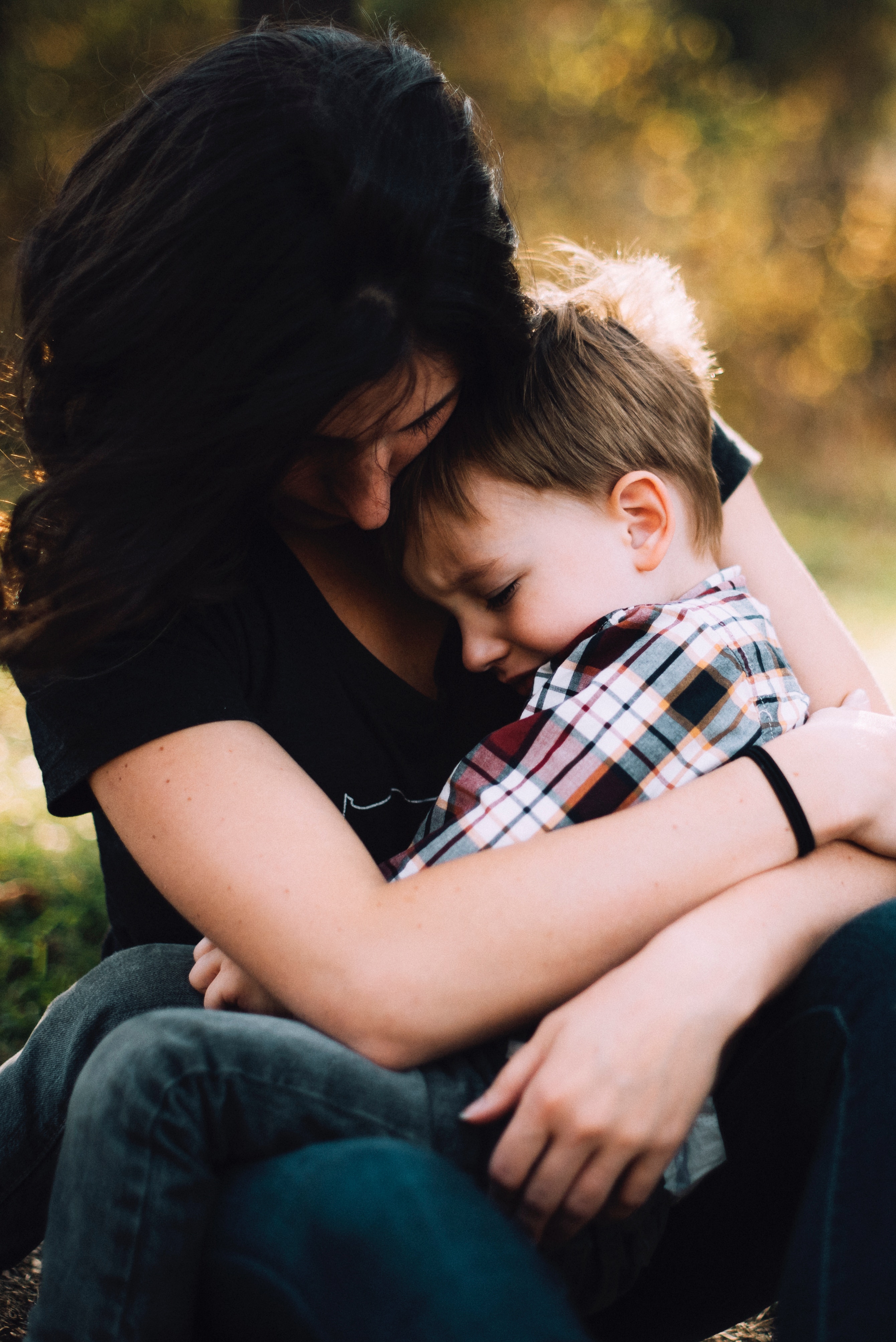 mom hugging son